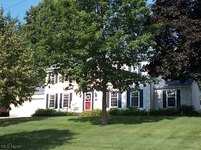 Welcome to this Silver Lake beauty! The Classic Center hall colonial will delight you as you step in the foyer. The spacious living and dining rooms feature glowing hardwood flooring and light softly flowing through the elongated windows with custom window treatments. The open floor plan encompasses the fully applianced kitchen, eating area and the newly carpeted family room with fireplace. French doors open into the 3 season sunroom that overlooks the patio and landscaped back yard. At the end of the family room you will find the library/study with built in shelving, a perfect spot to get away with a good book or office/study space. The updated half bath and wall of pantry cabinets concludes the main floor. Upstairs you will find the spacious master suite with new carpet and remodeled bath w/mahogany vanity, matching cabinets, lighting and pewter fixtures, updated step in shower and a 8 ft. wall of closets complete with organizers. The main bath features an upgraded vanity, light