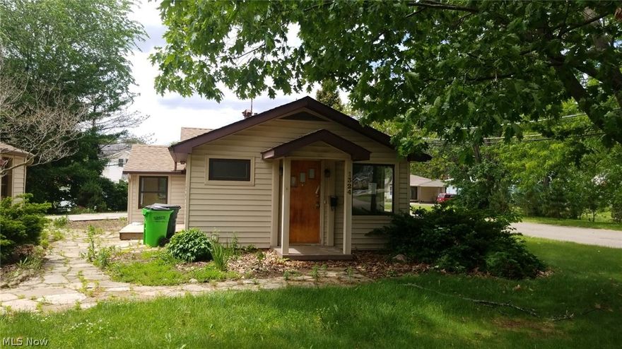 Looking to downsize or a first home! This two bedroom home located in Barberton near Norton Plaza. Laundry is upstairs could be used as 3rd bedroom. Needs cosmetic repair and updating.