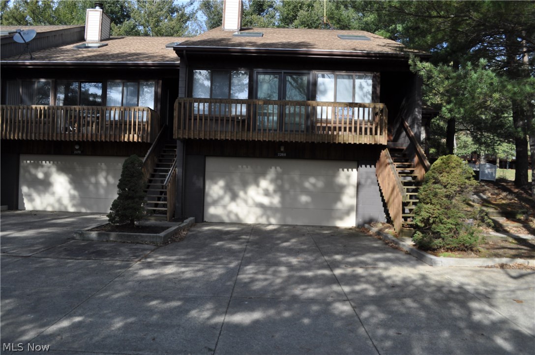 Nature has provided the backdrop for walking, jogging, bird watching or just enjoying the outdoors. This is a corner unit with private patio and attached storage shed. Gargantuan vaulted great room with wall gas fireplace and entrance to deck. The master bedroom offers walk in closet, plantation shutters and ceiling fan. The carpets were just professionally cleaned, condo is move in ready. First floor laundry. Kitchen with ample cabinetry, countertop space, pantry, lazy susan and breakfast bar. Formal dining room with space for hutch and table w 6 chairs. Bonus 2 car garage . Conveniently located to Metro Park, interstate and Portage Lakes!