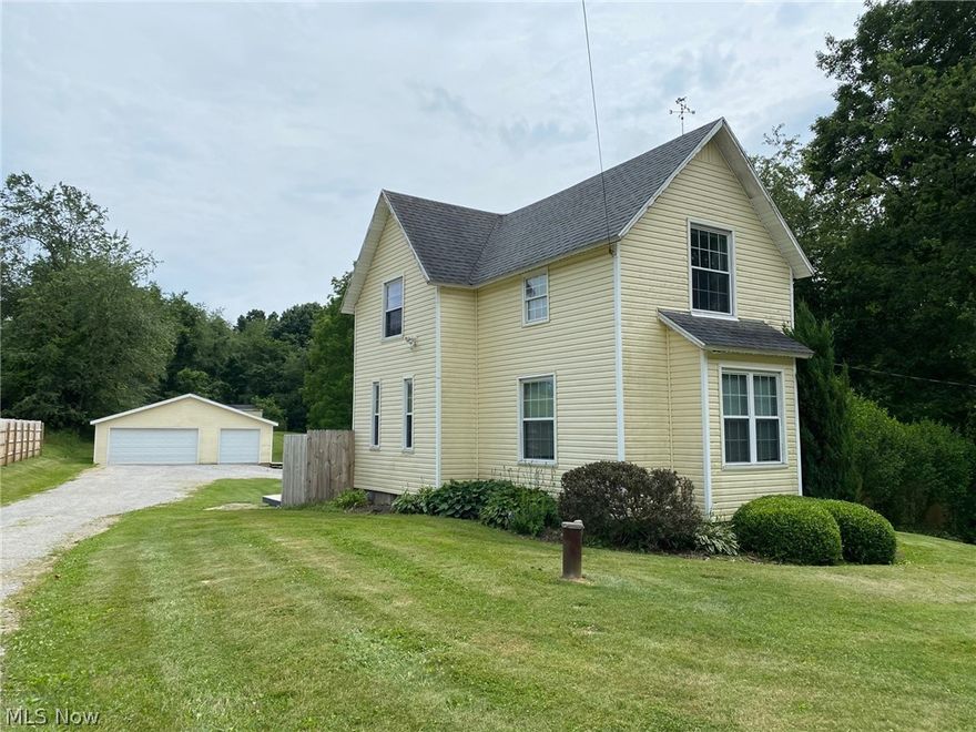 Attention investors/flippers!  This home has so much potential for the buyer who can complete some finishing. Great location in North Industry with a one-acre lot and newer (2012) 32x32 3-car garage with opener and single rear door.  This home has 3 bedrooms, 2 full baths (master bath upstairs needs remodel finished but has plumbing ready and commode in place), kitchen w/stove, microwave, and tile floors, 1st floor laundry closet w/washer & dryer, 1st floor bedroom, tall ceilings on main level. Seller has replaced all windows except 1 upstairs. Roof is approx. 12 years old. Vinyl siding on one side needs completed. Don't miss your opportunity to turn this home into the showplace it can be! Located just minutes to I77 and Rt 30. Cash buyers only.