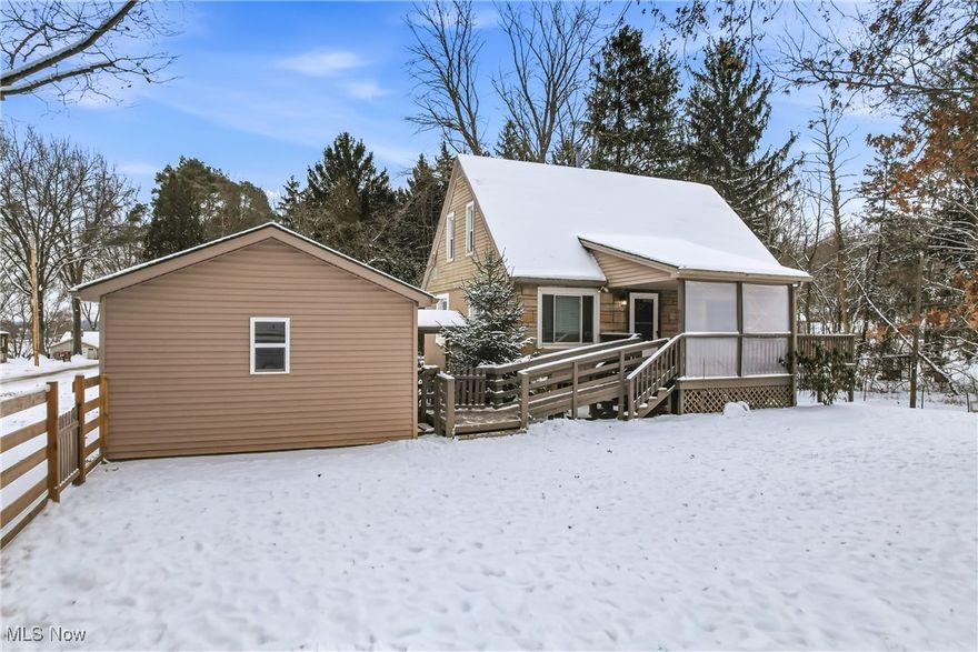 Charming Cape Cod nestled on nearly an acre in Canfield Township! Enjoy a peaceful, tree-lined setting with the convenience of nearby shopping and restaurants, plus easy access to many metropolitan parks and the county fairgrounds.

The home is easily accessible from the driveway, with a 1½-car garage and a welcoming covered front porch. The true highlight of this property is its location — the street dead-ends into a nature preserve and bird sanctuary, offering privacy and incredible natural beauty right outside your door.

Step inside to find beautiful hardwood floors throughout, all-new windows, and updated lighting that brightens every room. The kitchen is warm and inviting, featuring LVT flooring, recessed lighting, and plenty of cabinet space for all your cooking essentials.

The spacious living and dining rooms provide an ideal layout for relaxing or entertaining. From the dining area, step out to the large deck overlooking a peaceful, wooded view — the perfect spot to unwind and enjoy nature.

Both bedrooms offer nice-sized closets and the full bath includes a newer walk-in tub/shower combo. Electrical and plumbing updates add peace of mind for the next owner. 
This 2-bedroom home is full of character and thoughtful updates. Don’t wait — schedule your private showing today!