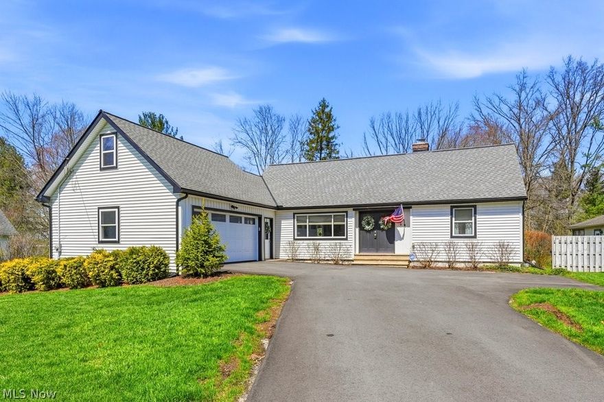 One of Chagrin Falls’ most coveted luxuries: sidewalks that allow you to meander into town whenever the mood strikes. Morning coffee runs. Farmers market strolls. A location that quietly upgrades everyday life. Expanded and reimagined in 2020, this home was designed with modern living in mind. Step into the foyer and you’re welcomed by beautifully restored hardwood floors and the home’s classic staircase. Natural light fills the living room, with views of both the front and backyard, creating a space that feels open and inviting. The Amish-built kitchen features custom soft-close cabinetry, quartz countertops, a cast-iron farmhouse sink, and a full suite of stainless appliances. The dining room offers effortless flow for both everyday living and entertaining. The hardworking main-level laundry/mudroom features more built ins (because...real life has backpacks, muddy paws, and grocery bags, and they all need somewhere to land). Bonus: an ATTACHED 2 car garage. Additionally there are two nicely sized bedrooms on the 1st floor, paired with a beautifully finished full bath.
Upstairs, the primary suite is a peaceful retreat with a custom walk-in closet and another full bathroom with a tiled walk-in shower and double-sink vanity. A delightful bonus room, currently the MOST charming nursery, offers flexibility as an office, studio, or 4th bedroom, complete with built-ins and generous storage.
And then there’s the walkout lower level.
Bright, expansive, and FULLY finished with a 3rd full bath, huge family room, and a potential fifth bedroom, gym or playroom. This lives like another full floor of the home, used just as easily and often as the rest. Full-sized windows and a sliding glass door pull in natural light and lead you directly out to the patio and large backyard with room for pets, gardening or kicking a ball around. You can bike into town for ice cream on a summer night and THAT's the kind of detail that makes people fall in love with where they live.