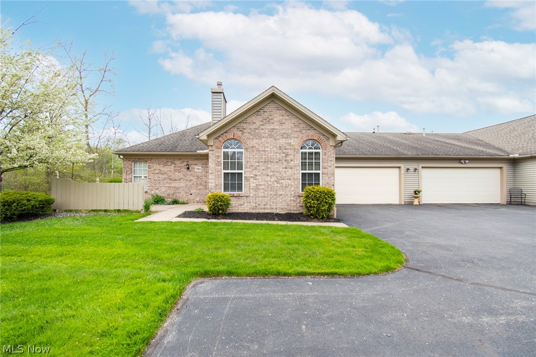 Enjoy your morning coffee on your private fenced in patio overlooking the woods in Willow Brook Condo Community. Updated two bedroom, two bath ranch. Spacious kitchen with updated cabinets and appliances. A great room with gas fireplace. Two car garage w/extra storage.
