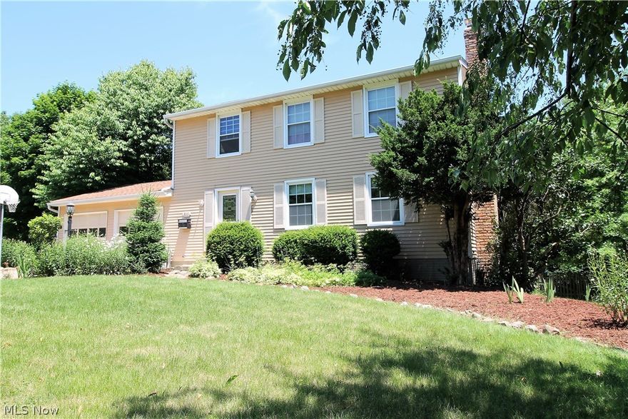 Welcome to the tranquil views of the water from this four bedroom, three full and half bath Colonial home. Come on into the inviting foyer to the living room offering a brick fireplace with built in wood storage, mantle and is open to the dining area and kitchen. The large, stunning, kitchen offers an abundance of cabinets and counter space, built in desk, stove/oven, refrigerator, dishwasher, and dining area. The family room has a slider door to the fabulous two tiered deck to enjoy entertaining, grilling out or just relaxing with spectacular views of the water and the gorgeous backyard. There is a half bathroom and laundry room to finish the main level. Upstairs you will find four large bedrooms and two full bathrooms. One of the bedrooms is the master suite which has a full bathroom that offers a beautiful bowl sink. The lower level offers a slider door to the backyard and a full bathroom, workshop, plenty of room for storage etc. There is a two car attached garage that offers a gas