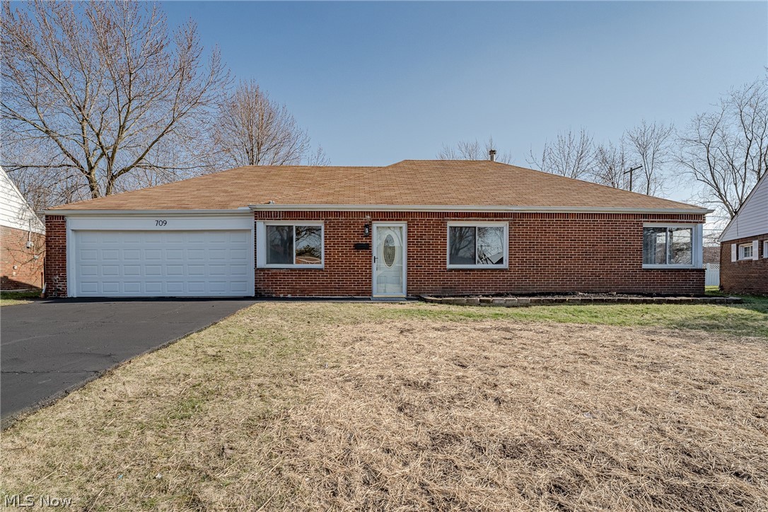 Move right into this extensively updated all-brick ranch on a quiet street in Euclid! This welcoming home features 1482 square feet of living space with 3 bedrooms, 2 updated full bathrooms, a completely renovated kitchen, fresh neutral paint, updated flooring, and more! The front door opens into the spacious, open-plan living and dining room that features LVP flooring that flows into the adjacent kitchen. Here you will find a full complement of stainless steel appliances, a trendy subway tile backsplash, granite countertops, and refinished cabinetry. Down the hallway are three generously-sized bedrooms, all with fresh carpeting! Two bedrooms have direct access to a completely renovated full bath with a step-in shower. A second completely renovated full bathroom off of the hallway boasts a granite-top vanity, a new tub, and a tile shower surround. On the other side of the home, a large laundry / utility room includes a high-end washer and dryer, built-in cabinets with a granite counter top, and access to the attached 2-car garage. A large enclosed back porch completes the interior of the home. Outside, there is a fully-fenced in back yard - perfect for kids or pets. Conveniently located just blocks away from shops, schools, parks, and highway access. Don't miss this opportunity for a truly turnkey home!