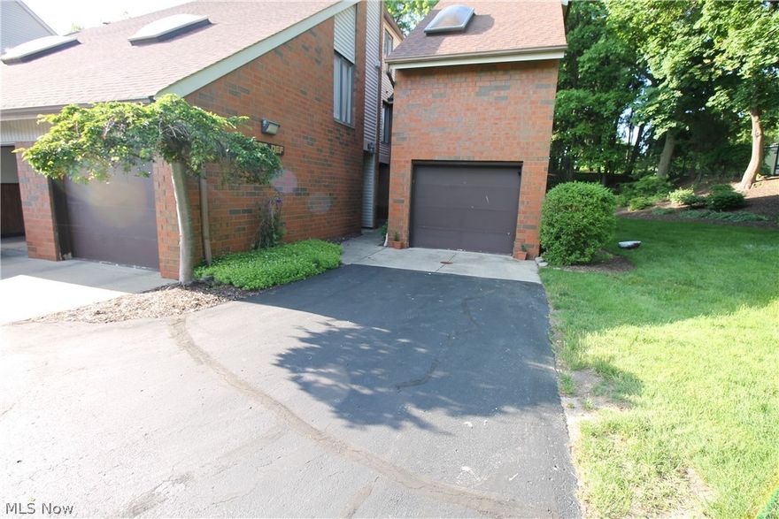 Easy one floor living and a convenient location! Enjoy this freshly painted, spacious condo with access to the garage from the unit with plenty of extra parking for visitors! Walk in from the garage into the laundry room with large pantry and then into the eat in kitchen.  The expansive dining room flows directly into the living room which boasts a sky light before exiting onto the private patio and green space.  The primary suite has a walk-in closet, and a private sink before walking into the bathroom.  The second bedroom has a walk-in closet.  POS has already completed and for that piece of mind, the Seller has included a home warranty!