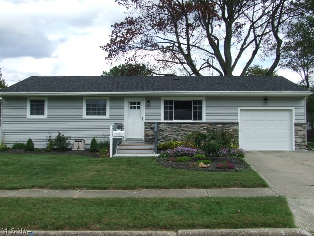 Better than new remodeled Ranch in Munroe Falls! New vinyl siding and stone exterior compliment the fresh landscaping and new back patio with firepit. Beautifully finished oak hardwood floors flow throughout this home, accentuated with lots of natural light. Dining area is open to the kitchen and living room and features a slider with a nice view of the partially fenced backyard. All new kitchen has ceramic tile floor, new cabinets and granite counters. All kitchen appliances stay. Master bedroom has a half bath while the other two bedrooms share a full bath. Finished lower level has 2 rec rooms, currently being used as bedrooms, both have closets. Lower level also has full bathroom, laundry room, and unfinished storage space. Attached one car garage has new door with opener. Great location is close to parks, schools and shopping, and easily assessable to Kent, Stow, Tallmadge and Akron. A Home Warranty is included with this home. The many updates include: new roof, gutters,