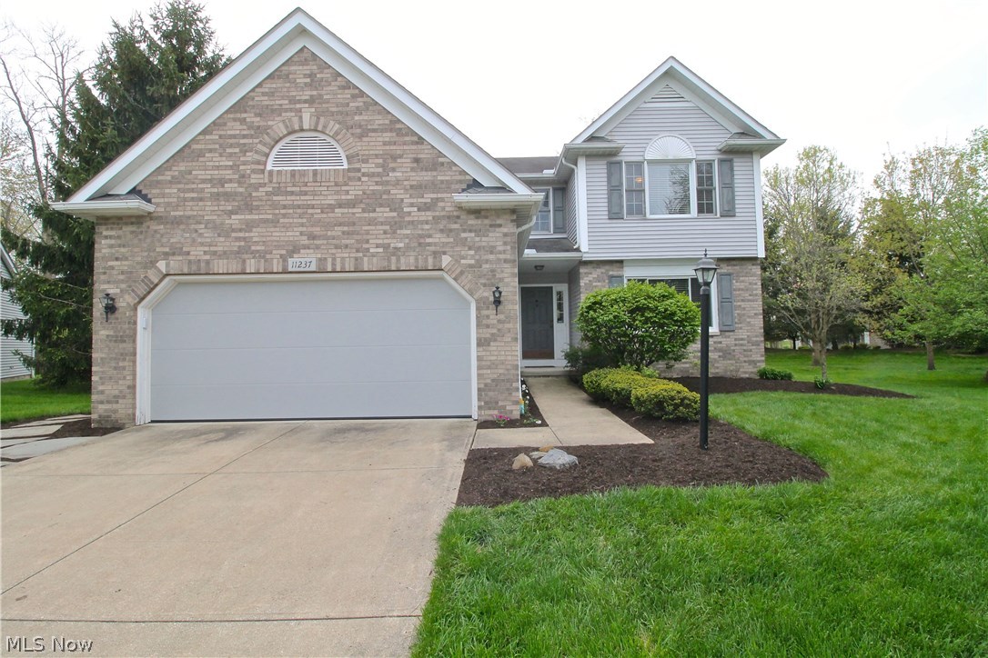 Enjoy Scenic golf course views from your FIRST FLOOR MASTER at Glenn Eagles Golf Course. This beautiful two story free standing home has a huge first floor master suite with walk in closet, master bath, and jacuzzi jetted tub. Open two story living room, dining room and kitchen with all major stainless steel appliances (2010), plenty of cabinets for storage as well as counter space along with an eating area and breakfast bar. The skylit great room brings in lots of natural light, flanked by windows is a brick woodburning fireplace to enjoy. If you need to just have quiet time there is a living room/sitting room on the first floor where you could enjoy a good book and your first cup of morning coffee. The open dining room gives you easy access to the outdoors and the spacious paver patio to sit outside and enjoy the beautiful views of both the green and tee boxes. Upstairs you will find 2 other bedrooms, a full bath along with a gorgeous loft that looks down into the great room, kitchen