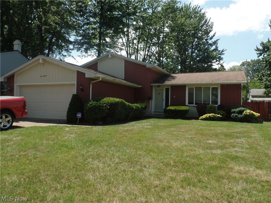 Cozy Split-Level in desirable North side area with several updates. Nice size kitchen with beautiful etched glass panel dividing kitchen from family room to retain heat from custom fireplace with blower. 4 bedrooms & 2 full baths with 1 bedroom & bath on lower level for guests. Security system & extra wide driveway for parking or boat. A must see!