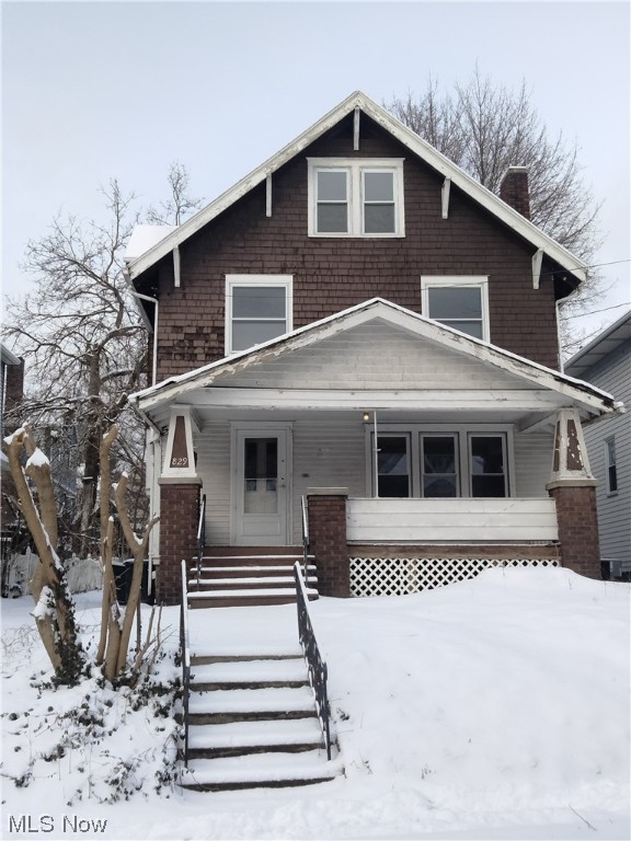 Great starter home or investment property. On the first level you'll find the living room with stained glass windows, dining room with built in drawers/bench, a bedroom in the back, completely refinished kitchen, and a full bath. second floor has 4 bedrooms, one including a walk out patio. Third floor/attic has 2 bonus rooms that could be used as bedrooms. Entire house has been re painted, and all hard wood floors have been redone. Call to schedule your showing today!