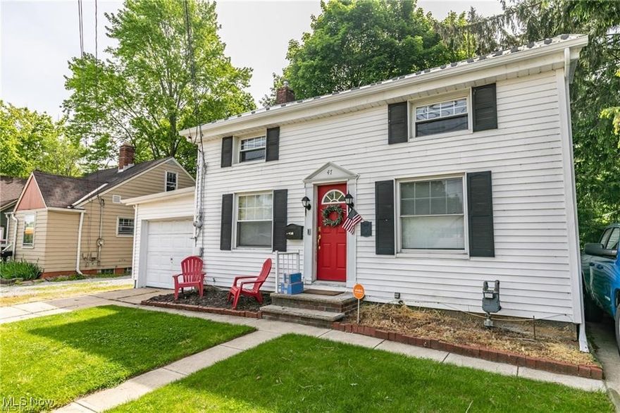 One of a kind in the heart of Berea! Welcome to this unique property just steps from downtown Berea and Baldwin Wallace University, and only 10 minutes from Cleveland Hopkins Airport. This home features a black metal roof (2020) newer appliances (2020), new AC unit (2025). A cozy first floor master bedroom includes its own fireplace and private deck overlooking Wallace Lake Park. Also on the main level you'll find a spacious kitchen, a large dining room, and a convenient half bath. Upstairs, two additional bedrooms and a full bathroom offer plenty of space. The walkout basement offers ample storage, a laundry area and access to a covered private patio. Don't miss your chance to tour this truly special home -- it might just be the most fun you've ever had at a showing!