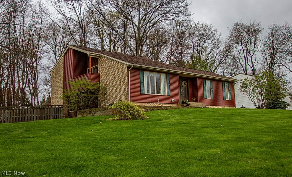 WOW! Great split level home, much larger than it looks! This is a very unique layout, very comfortable & functional. Because of lot/land, all 3 main levels are completely above ground they have plenty of light. Upper level has 3 bedrooms, 2 full baths including hardwood floors & a master bedroom with 2 walk in closets, slider glass door & deck! Main floor- toward the front of home, has large bay window in the Livingroom with hardwood floors, and wonderful foyer. The main level- towards the back of the home boasts a wonderful updated kitchen, dining room, family room walks out to back patio, half bath & main floor laundry off the kitchen. Then there is also a lower level (4) below grade that is clean, and spacious storage in the basement. Many other updates: Furnace and Air Condition in 2009, Main bathroom redone in 2011, New Carpet in November 2013, Kitchen appliances 2012, kitchen counters, sink and faucet in 2014! Call today for a showing.