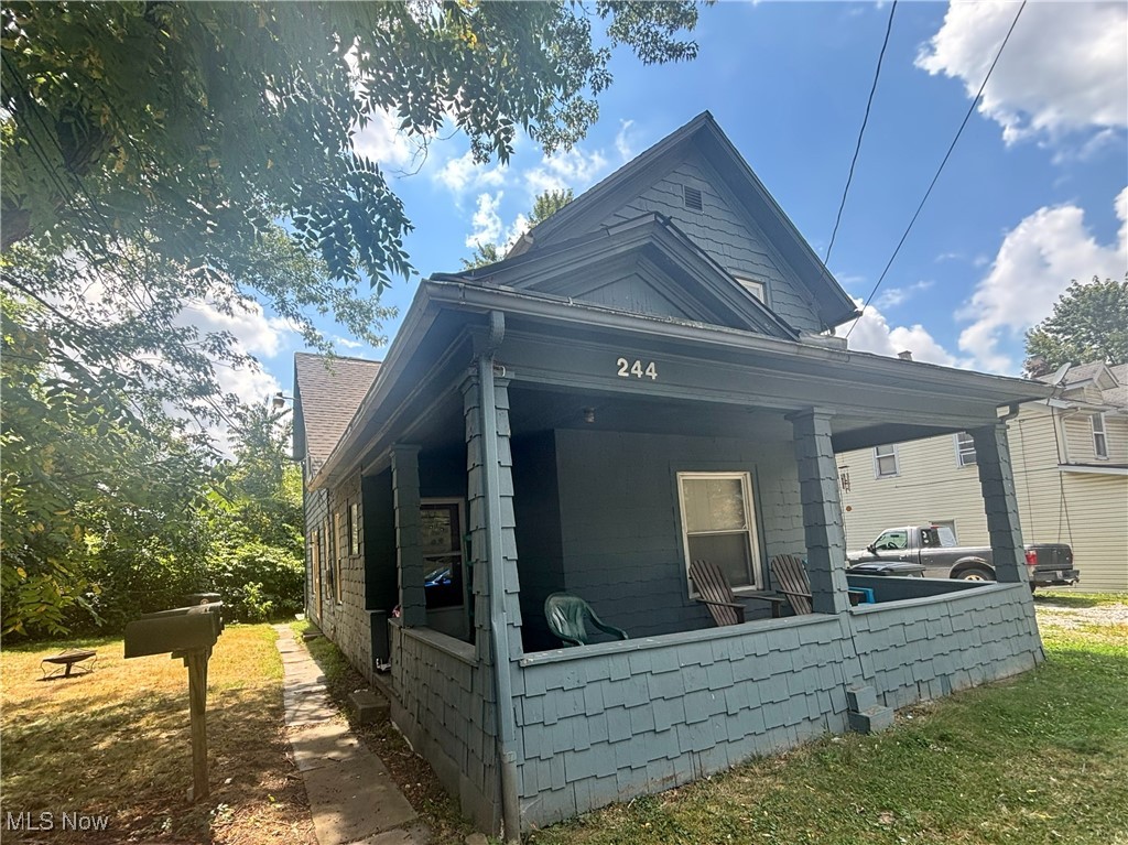 ATTENTION INVESTORS - TRIPLEX FOR SALE. 244 Crosby is a well-maintained triplex offering unlimited potential in a convenient Akron location. The property consists of one 2-bedroom apartment, one 1-bedroom apartment, and an efficiency unit. A new roof was installed in June 2023. All units have had various updates in the past few years. The property is currently generating $1,900 per month in gross rent. All three units are leased through April 2026. The property operates with one gas meter, one electric meter, a single furnace, and a shared hot water tank, simplifying utility management. Inside, each unit offers functional layouts and abundant natural light, and the exterior includes off-street parking and a covered porch. This triplex is ideally positioned close to downtown Akron, Highland Square amenities, and major commuter routes. The property is being sold as-is. Note that some photos have been digitally enhanced to remove clutter or tenant's personal items and are for illustrative purposes only. The original photos are included for comparison.