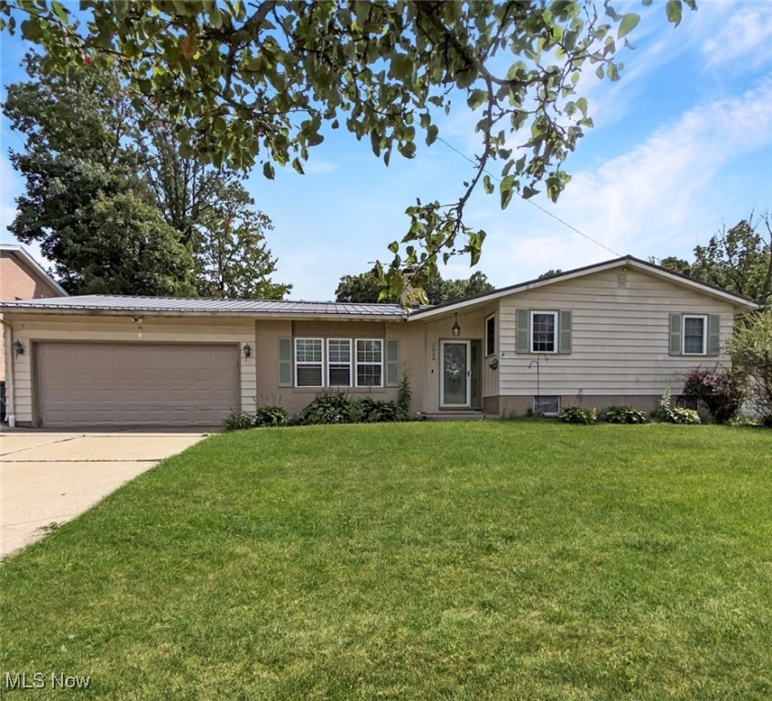 This spacious split level has been beautifully updated over the past several years and includes three bedrooms, two full baths + 1/2 bath, living room with beautiful stone gas fireplace, step down family room, fully applianced kitchen + eat-in- kitchen. Bonus features include: vaulted ceilings, neutral color scheme throughout, large pantry area, additional storage behind garage area and in-ground pool (pool is stainless steal / does not need a lner)! Upgrades/Improvements include: Basement waterproofed by Be Dry (2015) metal roof (2016), upgraded furnace to GreenWorks motor (2015), A/C (2016), newer electric 100 amp, new French drains added in yard (2016), improved tie wall (2015), pool pump (2010), pool heater (2016), deck (2011), kitchen remodel (2018) *stainless steel appliances + shiplap*, remodeled master bathroom (2015) *tasteful + tile, remodeled 1/2 bath in the basement (2017) Basement renovation and remodel in 2023. Nest thermostat and security camera's for peace of mind.