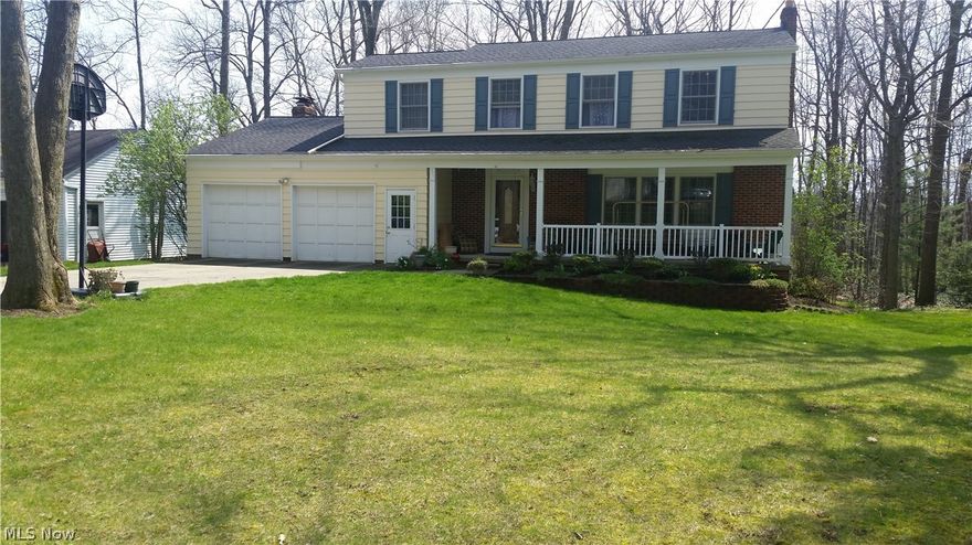 Beautiful, move in ready home in award winning Solon school district!  This home was completely remodeled in 2013; everything is new in the basement and entire 1st floor - including heating, cooling, electrical, breaker box, hot water tank, walls, flooring.  All new windows throughout the entire house in 2013.  Roof was replaced approximately 10 years ago. Granite countertops in kitchen, stainless steel appliances.  Open concept Kitchen, eat in area and living room are all combined, and have laminate floors.  The remainder of 1st level and all rooms on 2nd level are hard wood floors.  Basement is carpet, with the laundry room tile floors.  Large deck off the living room has beautiful view of the wooded back yard with view of creek and pond.