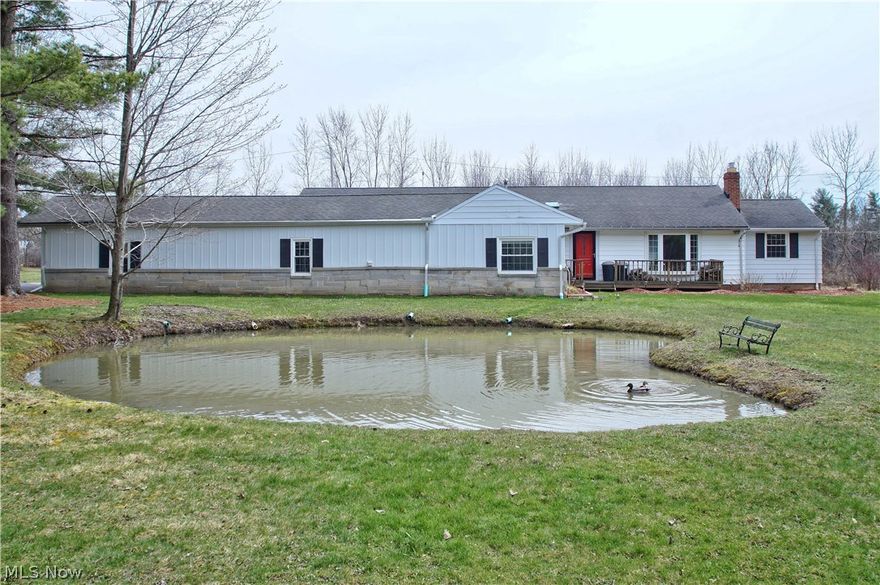 Not cookie cutter . Very unique and versatile home on a peaceful quiet street. Floor to vaulted ceiling wall of windows complement the large great room addition. Sitting on 2 acres with a mini pond that sustains its own little concert of peepers and frogs etc.. Freshly painted in addition to much newer flooring baths and carpet..Owner will miss " The greatest neighbors ever"...Its also an energy efficient home with 100mb+  high speed internet available. Functional workshop and cared for pridefully. Come see your new home..
