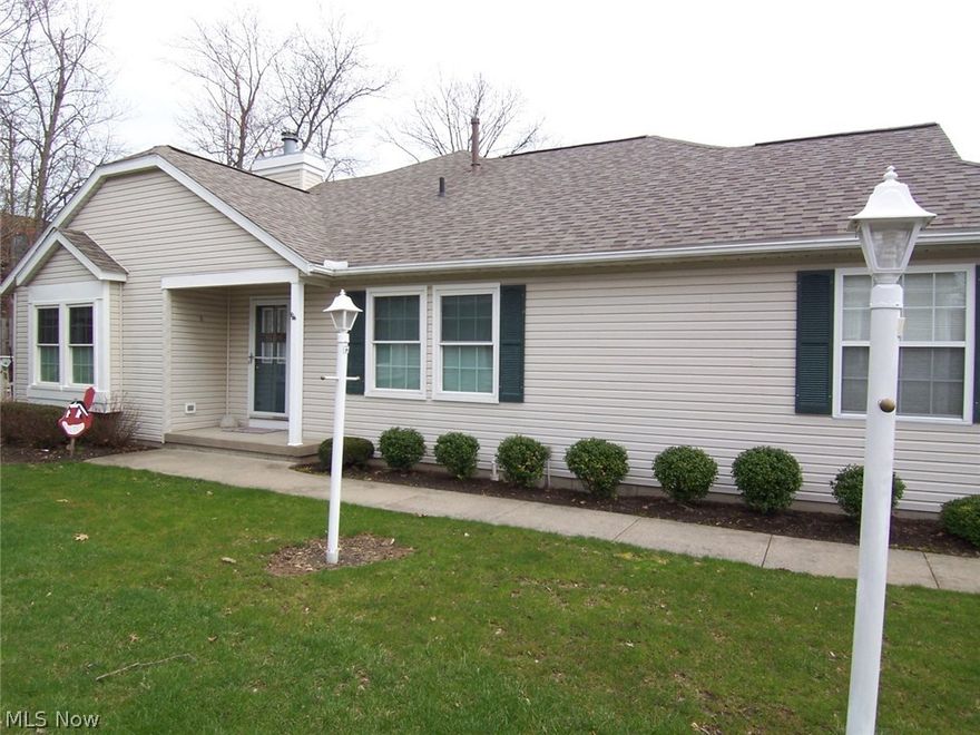 This lovely condo is located in popular Woodbury on beautiful Woodbury Oval! There are 2 bedrooms, 2 1/2 baths, a fully appliancedl kitchen w/breakfast bar, featuring a stainless steel range, M/W oven, and black w/stainless refrigerator (all less than 3 yrs old). There is a formal dining area, a vaulted great room with a gas fireplace, a 1st floor laundry (updated with storage cabinets, sink, and flooring - washer/dryer does NOT remain), and a finished lower level with a family room, an office area, and an additional finished area that could easily be a 3rd bedroom. The owners have also added a half bath for convenience! There are MANY updates thru-out. The Great Room, Dining Area, and both Bedrooms, have been updated w/Allen & Roth Hand scraped Wood Plank Laminate Flooring, the Kitchen & Foyer have been updated w/Coretec Plus vinyl tile, as well as ceramic tile in all three Bathrooms! The windows have been replaced with Champion Comfort 365 windows w/a transferable Limited Lifetime Wa