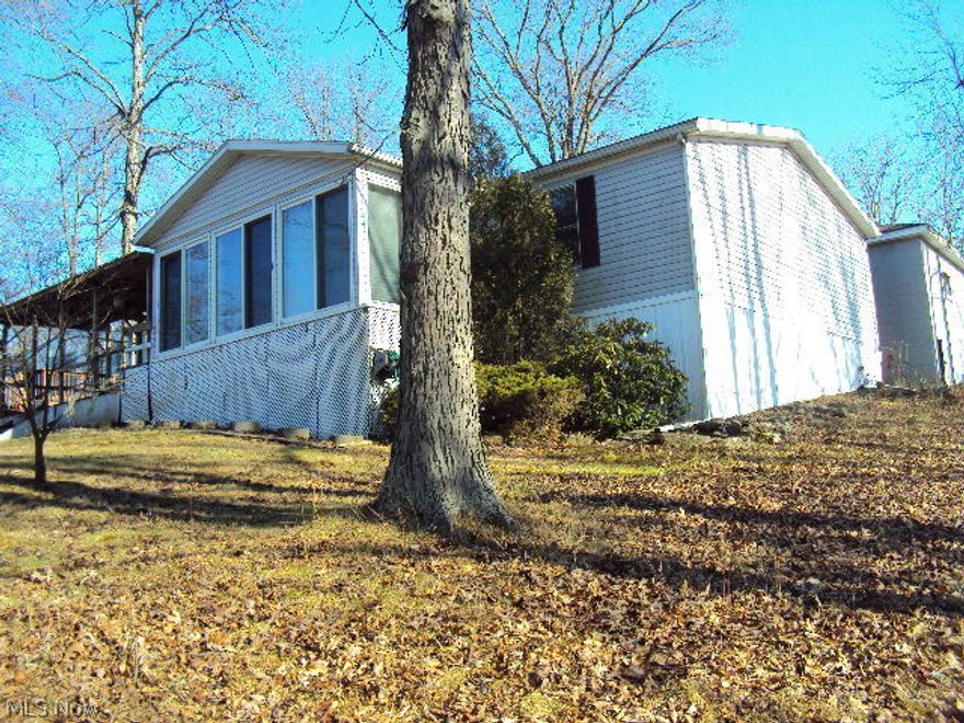 Looking For A Lake View and Fishing Walking Distance From Home? Nice 1997 Manufactured Ranch Style Home at Vo Ash Lake- 10 Acre Private, Members Only. Home Offers Kitchen, Dining Area, Laundry Room, Master Suite w/Private Bath and Walk In Closet, Three Bedrooms Total, 2 Full Baths, Large Sunroom Offers Beautiful View Of Lake.  Nice Affordable Place To Call Home ! Property Has It's Own Well, Most Homes In Community Are On Shared Wells.  Also Includes Parcel 280001236000