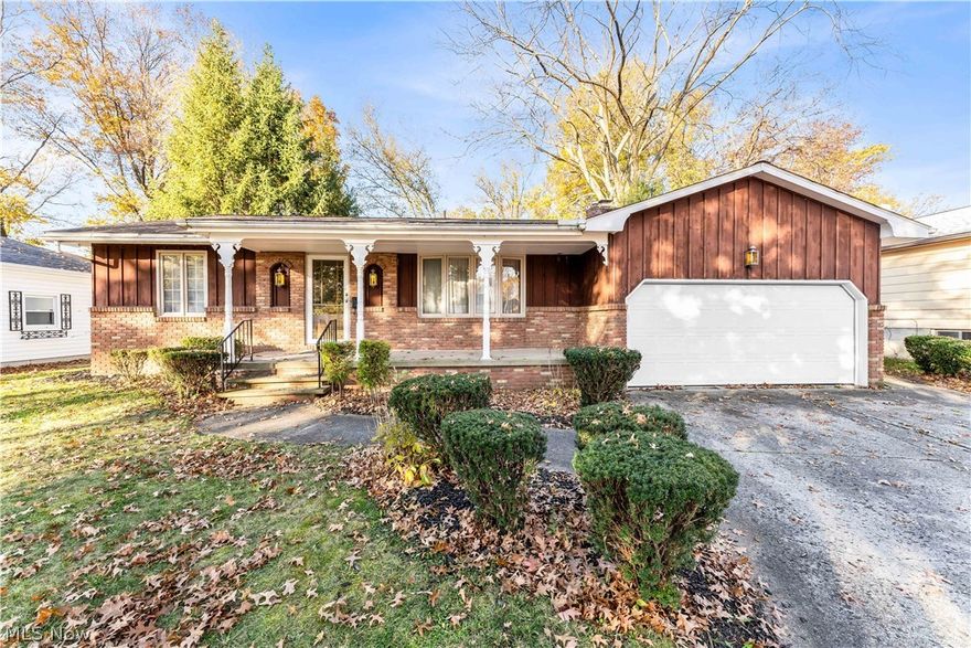 Move in ready ranch home with all new carpet and very well maintained. 3 bedrooms 2 full baths. Full basement with bar. All walls plaster. Home has unique finishes. Beautiful granite fire place. Brand new caret. New AC. New sump pump.  Attached garage. Amherst School disctrict. All new windows that bring in tons of natural light. Backyard backs up to park. Great location! Must See!!