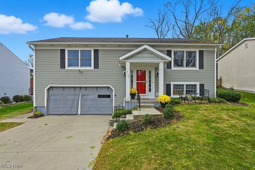 Immaculate Bi-level with nearly 2000 square feet of living space located in a prime Cuyahoga Falls neighborhood.  
The spacious eat-in kitchen is fully updated with granite counters, white cabinets, recessed lighting, stainless steel appliances, and gorgeous wood laminate flooring. This meticulously maintained home backs up to Kennedy Park, creating your own personal park view. Additional features include:  a custom walk-in closet, an ensuite main bedroom, a sunbathed four-season room with a heat-producing electric fireplace, wood Anderson windows,  beautiful wood laminate flooring, an open floor plan, a huge 24x14 lower level family room with attached 1/2 bath, ceiling fans with remote controls, and much, much more!