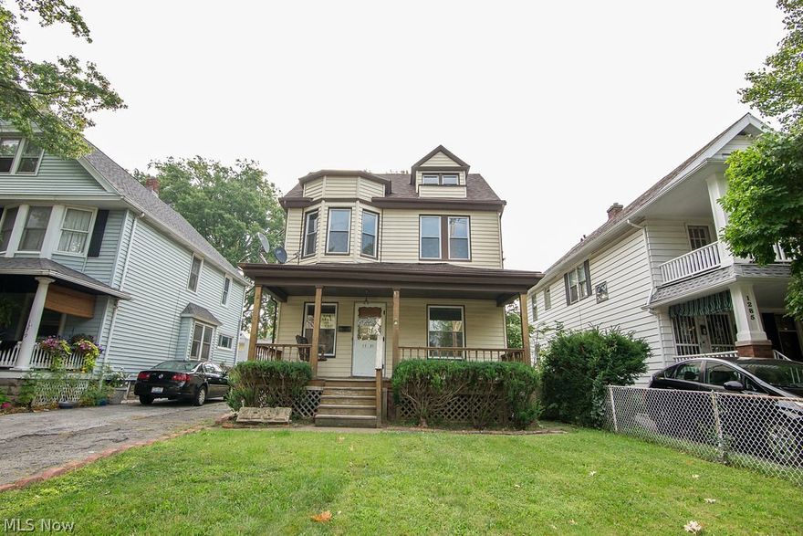 Cleveland living with colonial charm in a thriving west side neighborhood! This versatile, single-family has five bedrooms, 1.5 baths, large dining room, full basement, outdoor space and more. The first floor features formal living & dining rooms, a family room, a kitchen, and a half bath. Seller to provide a $3000 credit to buyer towards appliances at closing. Gorgeous, original, hardwood flooring throughout the first floor with original, wood storage bench will have you falling in love. The second floor offers four bedrooms, one with an adjoining door, perfect to convert to a huge walk-in closet or nursery. Carpeting in upstairs bedrooms is new. The finished third floor could be a bonus room or a fifth bedroom! Patio area in the nicely-sized backyard is ready for your customization! Plus, a brief walk to Clifton Blvd. and you can be a part of all of the new establishments recently developed, such as Lucky's Market, Landmark, Dinerbar on Clifton, and so much more!