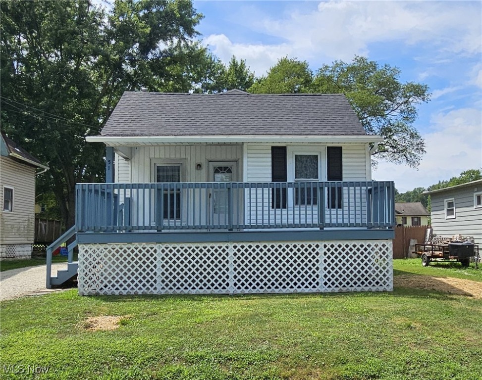 This charming 3 bedroom, 1 bath bungalow is ready for you to move in and call it home! Two of the bedrooms, the bathroom, kitchen and dining room are all on the main level for convenient one-floor living. The second floor is comprised of one large bedroom. Recent updates include fresh paint, new carpet, new roof and gutters, and remodeled bathroom for peace of mind. Other amenities include high ceilings throughout, a large front porch, enclosed back porch, and large back deck for your enjoyment. A great starter home or investment opportunity awaits - schedule your viewing today!