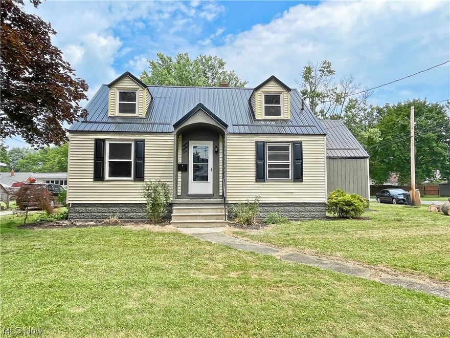 Charming, inviting, and move in ready home! This cape cod style home has a freshly painted interior and offers 4 bedrooms, two of which are conveniently located on the 1st floor, along with a full bath. As you step inside, you'll be greeted by the warm embrace of beautiful hardwood floors that flow seamlessly throughout the home. The spacious living room has a decorative fireplace. The kitchen has stainless appliances, new cabinetry, new countertop, and new LVT flooring.  The 1st floor bathroom shares the same flooring and has a new sink and toilet. The walkout basement has glass block windows.  NEW roof (gutters to be installed prior to closing) NEW furnace. NEW central air.  NEW hot water tank. Don't forget about the 1 car attached garage.  This home is located on a corner lot with a spacious yard with a fire pit. Call today to make this  newly renovated home yours!