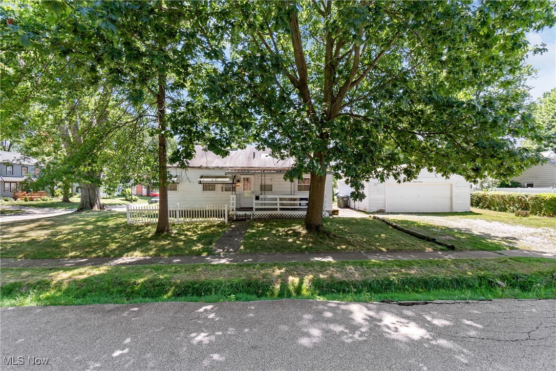 Welcome home to 1818 Jefferson Ave in desirable Cuyahoga Falls. This property is perfectly located in the heart of Cuyahoga Falls, close to Portage Crossing and downtown Cuyahoga Falls. The home boasts roughly 800 square feet, three bedrooms and one full bath, on all first floor living. This corner lot features a oversized two car garage, covered front porch and covered deck. The perfect for place for quiet mornings or entertainment. Note worthy items include: recently powerwasher, carpets shampooed, updated electrical panel, glass block windows, and PVC plumbing. Recently rented for $1200.The property offers tons of potential and is awaiting it's new owner! Call/text for your private showing today!