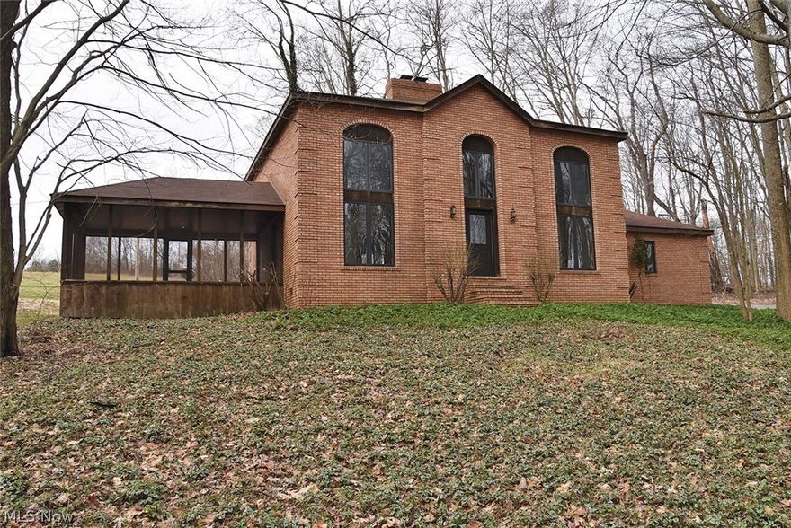 THIS IS TRACT 1 - Unique Properties! Brown Twp. - Carroll County, OH - Tract 1: 3-Bedroom Brick Home & Guest Home On 7.9 Acres - Tract 2: 2-Bedroom Field Stone Home on 7.9 Acres - Tract 3: 2-Acre Building Tract - ABSOLUTE AUCTION, all sells to the highest bidders on location: Saturday - May 12, 2018 - 10:30 AM - TRACT 1: 3186 Lander Rd., Malvern. Mostly wooded 7.9 acres with private setting comprises 2-story brick home built in 1983. Home features large great room w/brick front fireplace, oak mantle, trim, and crown molding. 16 ft. ceiling. Large screened-in porch. Country kitchen w/dinette area. 1st floor bedroom. Full bath w/1st floor laundry. 2nd floor w/bedroom w/full bath and 3rd bedroom both overlooking great room. Attached garage. Elec. & wood heat. Guest home w/living room, kitchen w/range & refrigerator. Bedroom, large full bath, office w/laundry, large walk-in closet. Laminate floors throughout. Screened in porch overlooking pond w/ waterfall. Elec. & wood heat. 24' x 32' ope