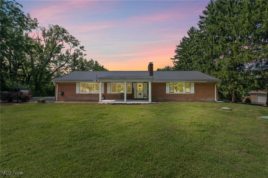 A rare find this beautifully updated Brick ranch home sits on over an acre and a half of land with trees and open usable space and is only 3.2 miles from downtown Chagrin Falls. Some wonderful features are the newer Metal roof,  Bluetooth ceiling speakers, Hardwood floors, stone fireplace, fabulous kitchen with Island breakfast bar,-amazing for bakers-, stainless steel appliances and a corner walk-in pantry. There are updates galore. The stone fireplace in the living room surrounded by builtins is a delight to look at and will keep you warm and cozy on those winter nights.  The lower level with play room and theater room (with a second fireplace) will be the fun space for all-whether you are entertaining or having a quiet day at home. This home is so cozy yet has almost 2800 sf of finished space to spread out in. The yard is amazing space for outdoor play or just enjoying the surrounding nature from the front porch or the back covered patio. The main floor office is such a bright and cheery work space.  Hot water tank replaced 2021. Hemlock Hills has a neighborhood pool that you could join top it all off. Make your appointment today! Showings begin Thursday 9/12 at 5:30 pm