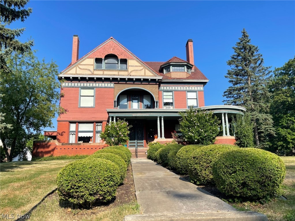 "Seller Financing Available!" This Victorian Professional Building is 3-stories and has 5,554 sf of office space. Property was professionally remodeled. This former home is an historic landmark that is listed on the National Register of Historic Places in Stark County. It was built for George E. Cook the owner of Princess Plow Co. The property is on .46 acres and is located on the corner of Market Ave. N and 15th St. NW. It has fabulous Victorian period details such as leaded glass, stained glass, wood floors some with parquet inlays, beautiful wood staircases, trim, doors, built-in cabinetry, exposed ceiling beams and tiled fireplaces with decorative mantles. Spacious kitchen and butler's pantry has floor-to-ceiling built-in wood cabinetry. The first and second floors have 10' ceilings. There are two and a half bathrooms. The full bathrooms are spacious and have all the Victorian details. The half bathroom is on the first floor. Side entrance carriage porch. Unique and beautiful covered front porch with circular end and lovely landscaping. Handicapped accessible. The roof is red tile. Parking in rear of building.