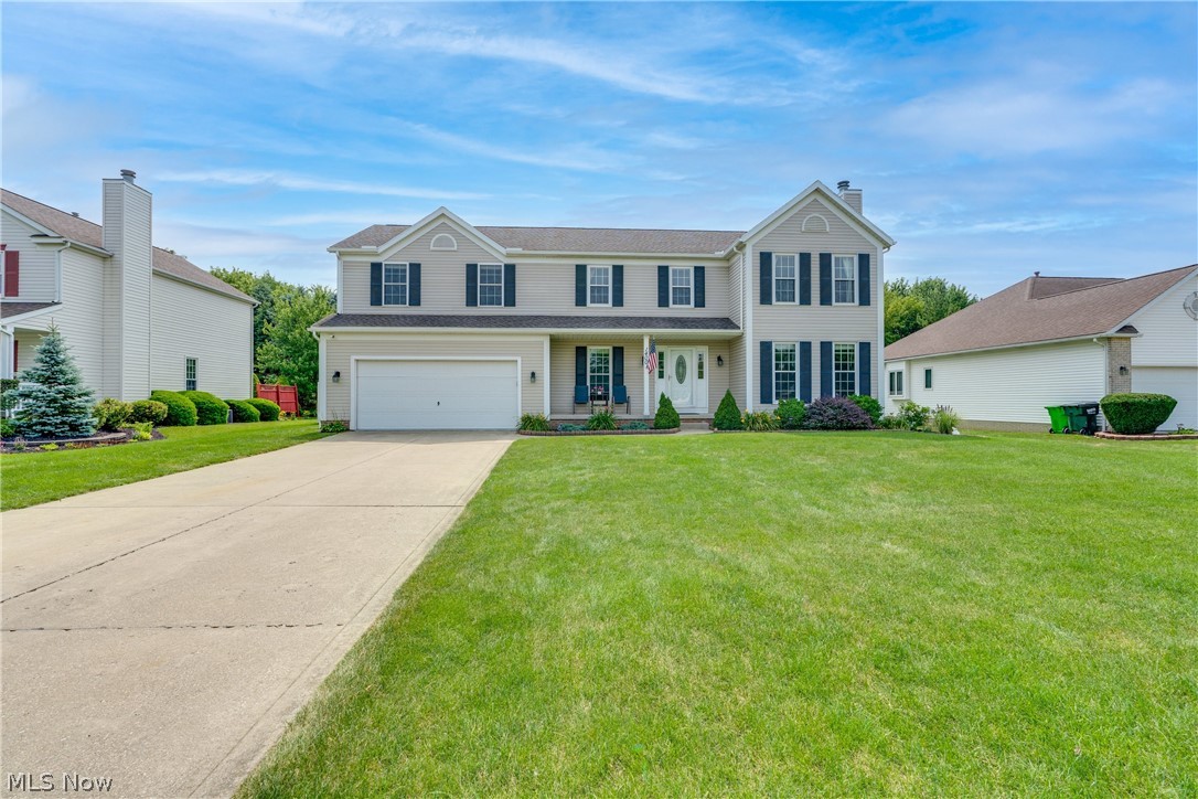 Welcome home to 1400 Timbertop Drive! This beautiful home offers amenities and updates galore! A paved driveway leads you to a spacious 2 car garage and the covered front porch, perfect for summer relaxing and enjoying the front landscaping. As soon as you enter the home into the foyer, you'll notice how bright and airy the home is. The living room features a beautiful, natural stone fireplace with a modern wood mantle. Flowing right into the dining room with a large sliding door, you'll love the easy care floors, and open space it shares with the gorgeous kitchen. Granite countertops, stainless steel appliances (except dishwasher), and a breakfast bar will make cooking and entertaining a breeze. Formal dinning room currently being used as an office. A first floor laundry room has access to the backyard, making it perfect for a quick mudroom if needed. Upstairs you will find a master bed and bath, including a garden tub and separate shower and boasts more natural light with 3 large be