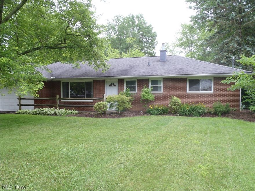 Newly renovated 3 bedroom with 2 full baths brick ranch situated on nearly a half acre lot in Northfield Center.  Walk in to the spacious living room that has been freshly painted with a newly installed front door and picture window. Enjoy both a dining room and eat-in kitchen in this updated ranch with new kitchen cabinets, counter tops, sink, faucet and appliances.  From the kitchen is an oversized laundry/mud room with direct access to the garage and outdoor covered patio.  All three bedrooms are spacious with generous closet space and the two full baths have been updated.  The entire home has new laminate flooring throughout and has been freshly painted. Other updates including furnace, HVAC, water heater, electrical box and more.  Great location close to major shopping, highways, schools, restaurants and places of worship.  Call today for your private showing!