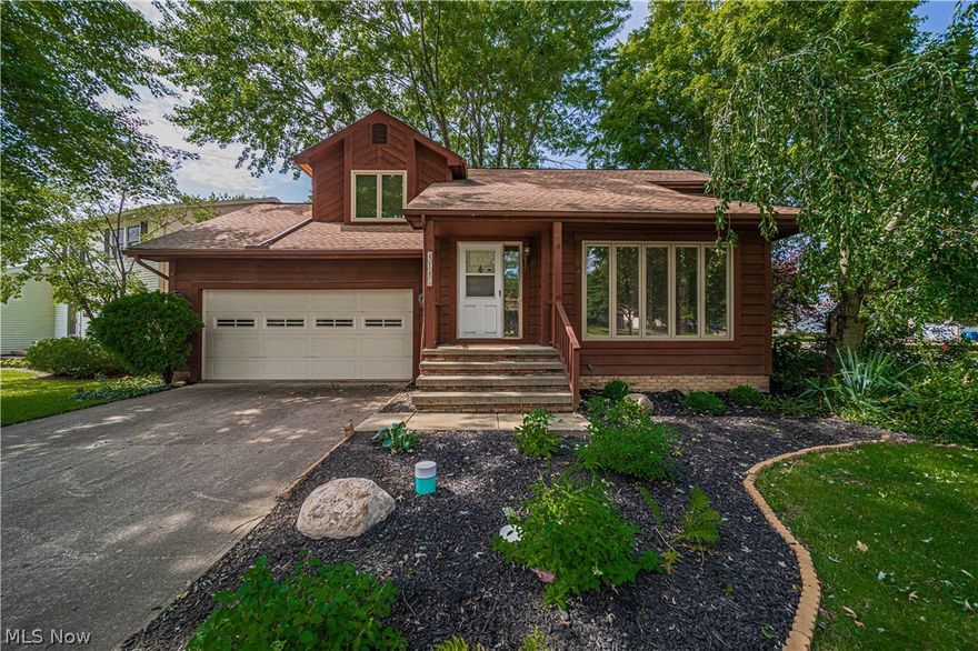 Vaulted living room opens into the dining room. Nature stone floor in garage.  Full finished basement with full bath. Enjoy the 3 season room, large deck and brick patio are the perfect area for outdoor entertaining. Fenced in backyard.  Built by 20th Century Construction.  Don't miss ou    t24 notice Tenant occupied home.
