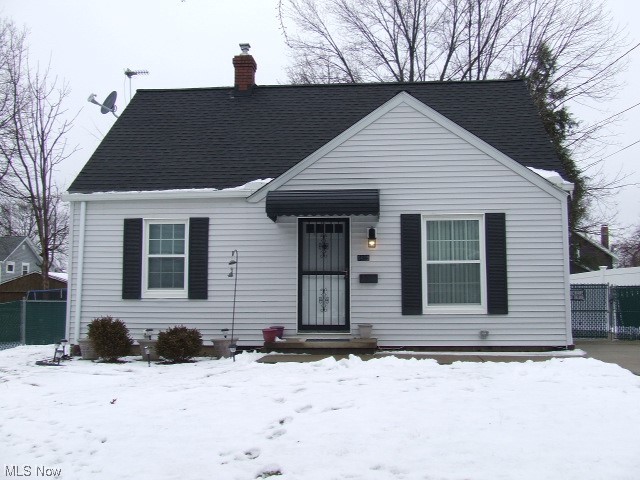 Wonderfully updated 3-bedroom Cape Cod with 2 bedrooms and full bathroom on 1st floor. Living room and all 3 bedrooms have new carpet, new paint and ceiling fans. Eat-in kitchen has farm sink, new cupboards and countertops, ceramic tile floor, and stainless steel dishwasher and gas stove. Updated bathroom with deep tub, newer surround, new medicine cabinet, built-in towel cubby, and ceramic tile floor. Top of stairs has shelf for those personal extras and bonus space that is perfect for dressing room, office, nursery or whatever you want it to be. Third bedroom upstairs has new carpet, new paint, new lighting with it's own baseboard heating, plug for window air conditioning, and closet with built-ins. Waterproofed Basement has area that could be used for rec room area or storage, laundry area with both electric and gas dryer hook-ups, utility sink, sump pump, glass block. Detached garage with carport that could cover a car or be a covered patio, with hot tub plug. Backyard is completely fenced in with privacy fence and chain link locked gate. Gate is currently at middle of driveway so pets could be let out the side door. Seller could move gate closer to garage so car could pull in further in the driveway. There is oak floors on first floor under the carpet in fair shape. Lawn mower and snow blower in garage will stay. This HOME is just waiting for you to move in!!