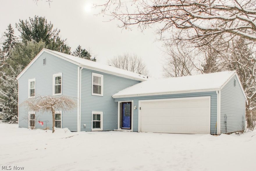 Split Level or Raised Ranch offers lots of possibilities for the new owner! Large, open front hall leads up to main floor living and down to cozy family room and additional bedrooms.  Main floor hosts lots of refinished wood floors in Living Room, Dining Room, Hall and Bedrooms. Newly remodeled (2012) kitchen has cabinets galore and new appliances, large central island for all your cooking adventures. Newer sunroom with Pella windows off of the kitchen has vaulted ceilings and new slider (2013). The deck has been recently renovated (2013) and offers a beautiful view overlooking the gorgeous open back yard. The home offers 2 bedrooms up and updated Full Bath (2013) and 2 bedrooms down with a 2nd full bath with new shower and toilet (2011).  The Family Room has been recently renovated (2014) with a gorgeous brick fireplace in one corner as the focal point!  Windows on the lower level make it bright.  Laundry Room in the lower level is spacious.  The home is located in close proximity to