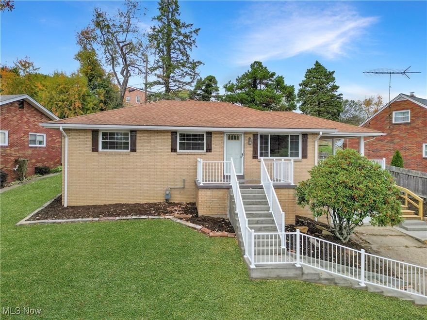 Welcome home to this beautifully updated 3-bedroom, 2-bath brick ranch located in the heart of Wintersville, Ohio! Conveniently situated near local shops, dining, and schools, this home offers both comfort and convenience. Step inside to find a stunning new kitchen featuring granite countertops, modern cabinetry, and new flooring throughout. Both bathrooms have been tastefully updated with contemporary finishes. The spacious finished lower level provides a large rec room—perfect for entertaining, relaxing, or a home gym. Enjoy outdoor living with a large covered side porch and a massive finished deck overlooking the backyard, ideal for gatherings or quiet evenings. Move-in ready and full of charm, this home combines classic brick construction with modern updates in a highly desirable location.