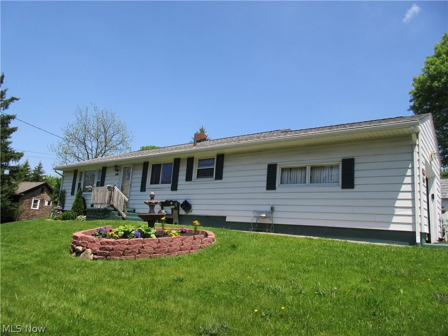 Move in ready 3 bedroom 2 bath ranch.  Over 1500 square feet living space includes large living room and recreation room, generously sized bedrooms and eat in kitchen.  Full basement provides plenty of storage space.  Recent updates include most window, deck and kitchen counters & flooring.  An attached garage, central air and low maintenance exterior complete this great value!