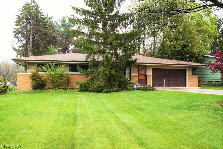 Impeccably kept brick front ranch on a park setting ready for you to make your own!  Pride of ownership shows  in this original owner home on over a 1/2 acre of beauty.  Ready for your ideas and improvements.  The bedrooms have beautiful hardwood floors, large dining/living room and added family room for relaxing and enjoying the view of nature overlooking the backyard.  Basement has a rec room with bar for entertaining as well as a workroom and large laundry area,, plus more!!  This home has so much to offer, make your appointment to see it TODAY!