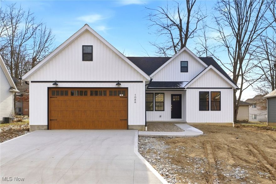 Exciting and rare opportunity!  4 bedroom, 2 bathroom ranch new construction home in a gated community in Green LSD!  You can't beat the location of this home - hidden at the end of beautiful Chenoweth Estates, an intimate extension of the neighborhood leads you into a gated community with fine homes and a quiet setting adjacent to Chenoweth golf course.  Immediately you will be stunned by it's curb appeal of tasteful vertical siding and premium garage door.  Walking in, you will love the cathedral ceilings living room that extends into the eat in kitchen with beautiful granite countertops and white cabinets.  Enjoy the convenience of having your master bedroom on the first floor with a walk in closet and large en suite bathroom featuring a beautiful custom tile shower.  An additional two bedrooms and full bathroom are located on the other side of the first floor.  What's even better is this home has a large finished basement featuring a rec room with endless possibilities and a 4th bedroom with a egress window and closet. The basement is plumbed for a 3rd full bath if you'd like to add it. The small HOA fee includes landscaping/mowing and snow removal for easy living.  A new construction opportunity in a beautiful neighborhood and ideal location that is move-in-ready is nearly impossible to find - come check it out!