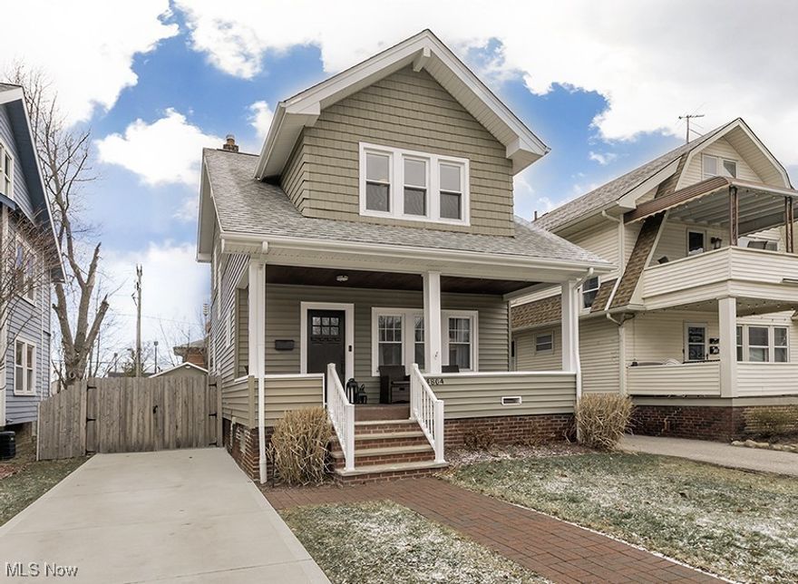 Welcome Home!!! Pride of ownership is the hallmark of this absolutely gorgeous and meticulously well maintained 3 bedroom colonial with welcoming front porch. Charm and elegance are evident throughout as the interior boasts gleaming and recently refinished hardwood floors, natural wood molding, high ceilings and a warm, inviting color scheme. Lovely living room affords loads of natural sunlight and a beautiful gas fireplace. Formal dining room with custom built corner cabinets. Fabulous kitchen provides access through sliders to the rear deck and offers granite countertops, subway tile backsplash, ample cabinet/counterspace and stainless-steel appliances. Nicely appointed bedrooms and a gorgeous, completely renovated, full bathroom round out the second floor. The lower level offers a recreation room with luxury vinyl flooring, glass block windows, a laundry area (washer/dryer stay) and plenty of additional storage space. Whether enjoying a morning cup of coffee on the front porch or hosting friends and family on the rear deck, overlooking the fenced in yard, the exterior and grounds are perfect for relaxing or entertaining! Newer: roof, cement driveway and drain, brick walkway, furnace and AC, front and side doors and added a gas line (for grill hook up). Simply Safe (security system) censors and camera can stay. Close to everything - great restaurants, shopping, Madison Park, freeway access and downtown Cleveland. This is an exceptional home, location and opportunity!!! Bring your most discerning clients - they won't be disappointed!