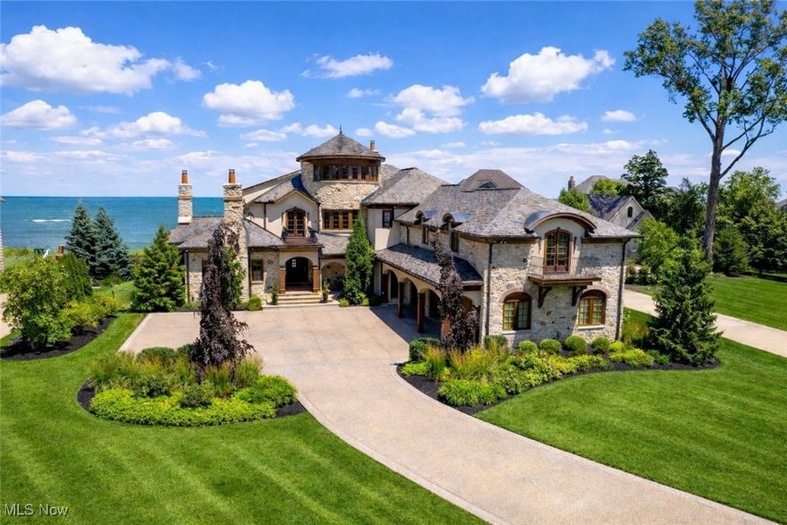 This Lake Erie waterfront residence offers the kind of lifestyle most only imagine. Thoughtfully designed with remarkable attention to detail, the home features custom finishes throughout, including Italian marble accents and a striking ostrich leather wrapped bar. The interiors, designed by acclaimed Miami designer Jorge Castillo, balance refined style with everyday comfort, creating spaces that feel both elevated and welcoming. Outdoors, the property shines with an inground pool, hot tub, multiple seating areas, and a pool house complete with a kitchen and bar, ideal for entertaining or unwinding by the water. Expansive windows frame uninterrupted lake views, making the shoreline a constant presence throughout the home. This is more than a place to live. It is the lakefront lifestyle you have been waiting for.