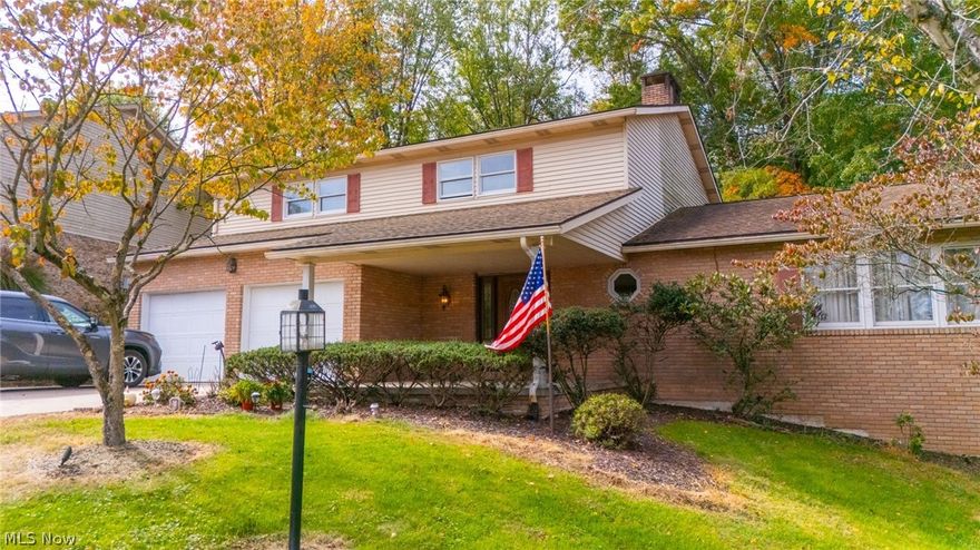 Located in one of St. Clairsville’s most prominent subdivisions, this spacious home sits on a quiet cul-de-sac and offers exceptional curb appeal with mature landscaping and a well-maintained exterior. With over 3,000 square feet of finished living space, the home features a massive, fully renovated kitchen, a dual-sided fireplace, and updated living and dining areas designed for comfortable everyday use. The property includes large bedrooms and updated bathrooms with modern fixtures and finishes. The lower level offers a finished basement with abundant storage and additional living or recreation space. The backyard has been transformed into a private gathering and entertainment area, perfect for hosting guests. An attached two-car garage and attractive outdoor spaces complete the property. Conveniently located in the Wellington Woods subdivision within the St. Clairsville-Richland City School District, this home combines size, updates, and location in a sought-after neighborhood setting.