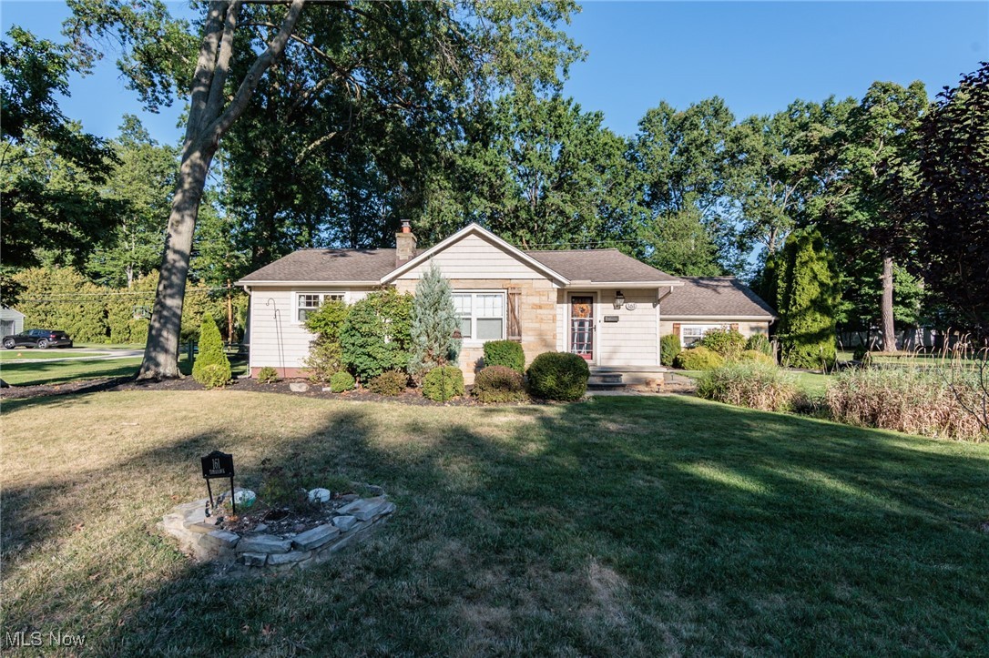 This Avon Lake ranch home offers wonderful curb appeal, on almost a half acre size lot !! The home includes 3 bedrooms and 2 full updated baths, including a private owner’s suite bath. The updated kitchen offers granite countertops, modern appliances, and all appliances will remain, making it truly move-in ready. The home features wood flooring throughout and a welcoming living room with a stone fireplace, adding warmth and character. A convenient laundry room with washer and dryer included adds everyday ease. From the main level, you step down into a spacious family room with access to the private backyard, complete with a patio and fencing, perfect for outdoor enjoyment. This layout combines comfort, modern updates, and timeless charm. Nestled in a desirable neighborhood, the home is close to schools, parks, shopping, and the lake! Make your appointment today!