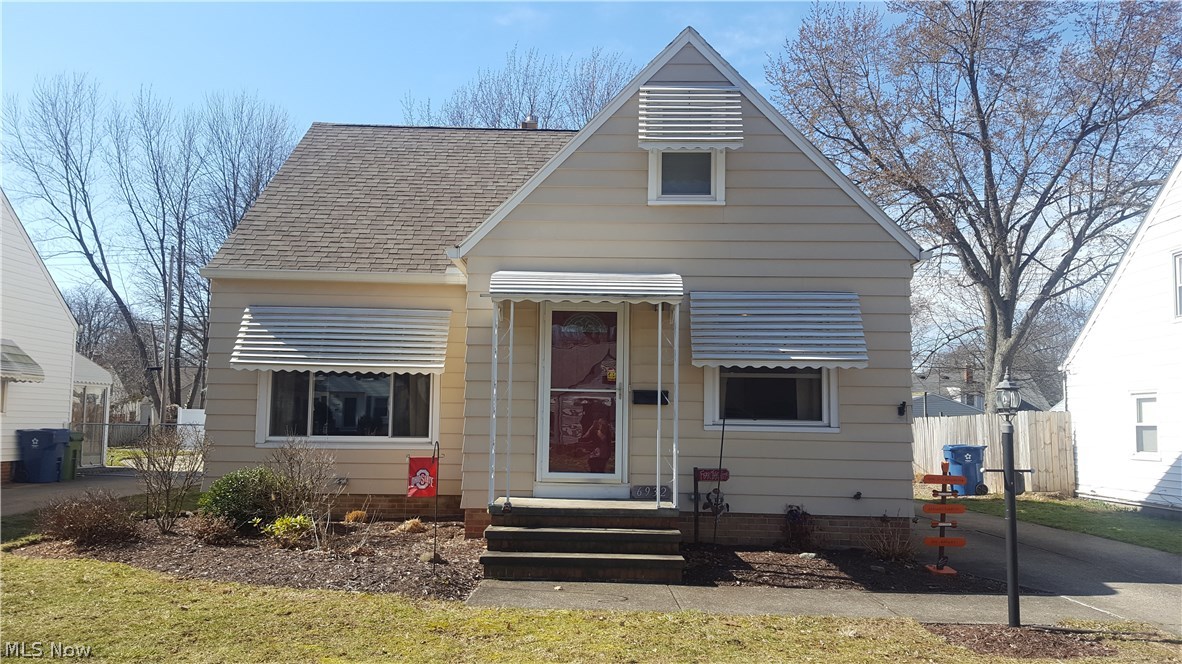 Welcome Home to this charming bungalow located on a tree-lined street in Parma Heights! This home is move-in ready and offers a ton of updates including the kitchen with ceramic tiling, light fixtures, appliances, roof, furnace, A/C, and windows all within the past 10 years. You will find gorgeous hardwood flooring throughout the first floor paired with fresh paint, neutral colors, and stylish curtain rods. There are original built-ins throughout the home and even extra cabinetry upstairs offering additional storage. Upstairs is where there is a bonus room that can be used as a nursery or office and tandem to the owner's suite with a large walk-in closet. What's even more special about this home is the huge finished sunroom where you can enjoy 3 seasons and the use of the hot tub just outside on the paver patio. The fully fenced-in backyard also has water features, a fire-pit, and a 3 1/2 car garage! The basement has a workshop area, another full bath with nature-stone flooring and eve