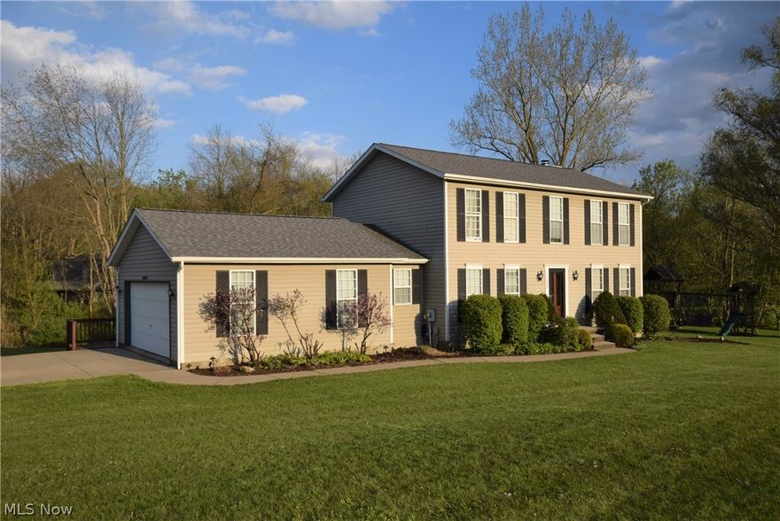 Welcome to 11658 Beechdale Avenue NW in Uniontown! This lovely 4 bedroom, 2.5 bathrooms home has numerous features throughout. The large eat-in kitchen is open to the living room and the back deck, allowing natural light to shine in, making it a bright cheery space. The kitchen was just completely redone in 2019 beautiful wood cabinets and gorgeous granite counter tops. A formal dining room is located off the kitchen, offering even more space for entertaining. Large living room is the perfect spot to gather and has a beautiful stone fireplace. Convenient half bathroom and laundry room are located on the main floor. Head upstairs to find a large loft area. Large master suite has a bathroom, shower and jetted tub and walk-in closet. Two additional bedrooms and a full bathroom are located upstairs. The full finished basement offers even more living space with a built-in wet bar and an additional room currently being used as the 4th bedroom! This setting is gorgeous with a large yard lined