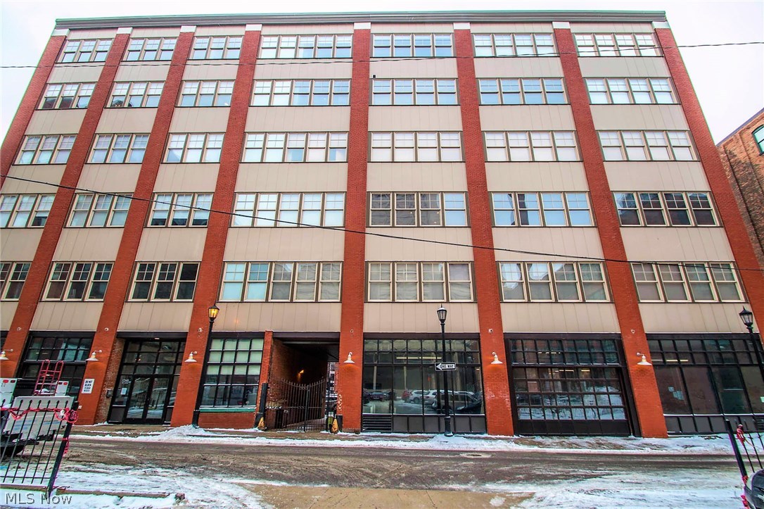 Welcome to this sophisticated and completely upgraded Erie Building Suite! Enjoy downtown loft living with all the storage and space of a single family home. Find exposed brick throughout and open ceilings that bring warmth and character to the space. The grand chef's kitchen features custom maple cabinets, stainless steel appliances, granite counters and oversized island that flows out to the living room, just one of the many reasons this unit is perfect for entertaining. Put on some music for your guests through the full unit built in sound system and head up the spiral staircase to enjoy the beautiful city views from your roof top deck. When it is time to relax look no further than the spacious master retreat. The private master bath boasts heated floors, dual vanity with granite counters and large tile walk-in shower. A private balcony is found off the bedroom as well as a massive walk in closet custom designed by California Closets. Have the square footage of a house in the heart