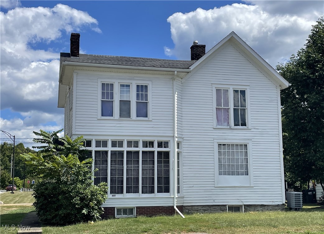 An Abundance of Space...This Old-Fashioned 2-story home offers a living room with decorative fireplace and French doors that lead to the sunroom with large sunlit windows. The first floor also offers an additional family room with a decorative fireplace. Huge eat-in kitchen with built-in pantry and washer/dryer hook-ups. The upstairs bathroom offers a claw foot tub/shower, perfect for relaxing after a long day. The Owners' suite offers a connecting room that could be a large closet or nursery. In addition to the Owners' suite, there are two other bedrooms.