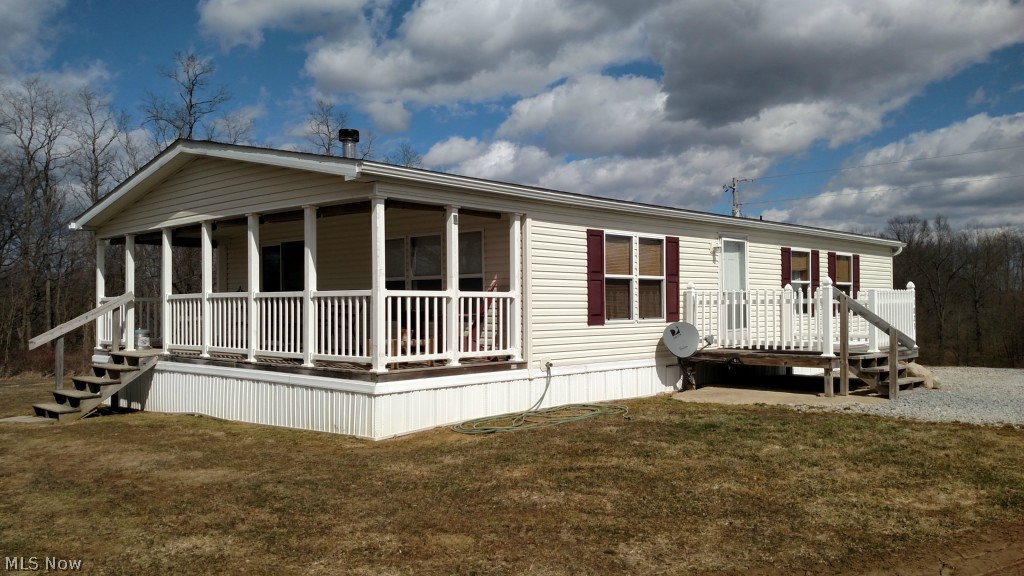 Here it is folks! This is a great opportunity to own a great home located in a private setting. This manufactured home features an open floor plan that is great for entertaining. The master suite includes a master bath with a grand tub. The wood burning stove offers a great source of heat on those cold winter days. New shingles were installed in 2010. This 5.4 acre property is a fantastic opportunity for those looking for a quiet retreat. Schedule your showing today!