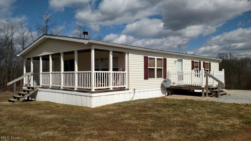 Here it is folks!  This is a great opportunity to own a great home located in a private setting.  This manufactured home features an open floor plan that is great for entertaining.  The master suite includes a master bath with a grand tub. The wood burning stove offers a great source of heat on those cold winter days.  New shingles were installed in 2010.  This 5.4 acre property is a fantastic opportunity for those looking for a quiet retreat.  Schedule your showing today!